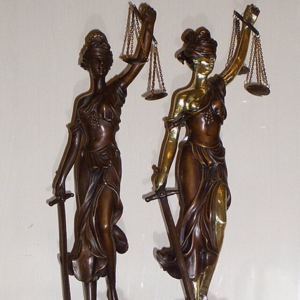 Two Lady Justice Statues