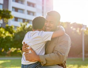 Father greets son after getting out of jail.