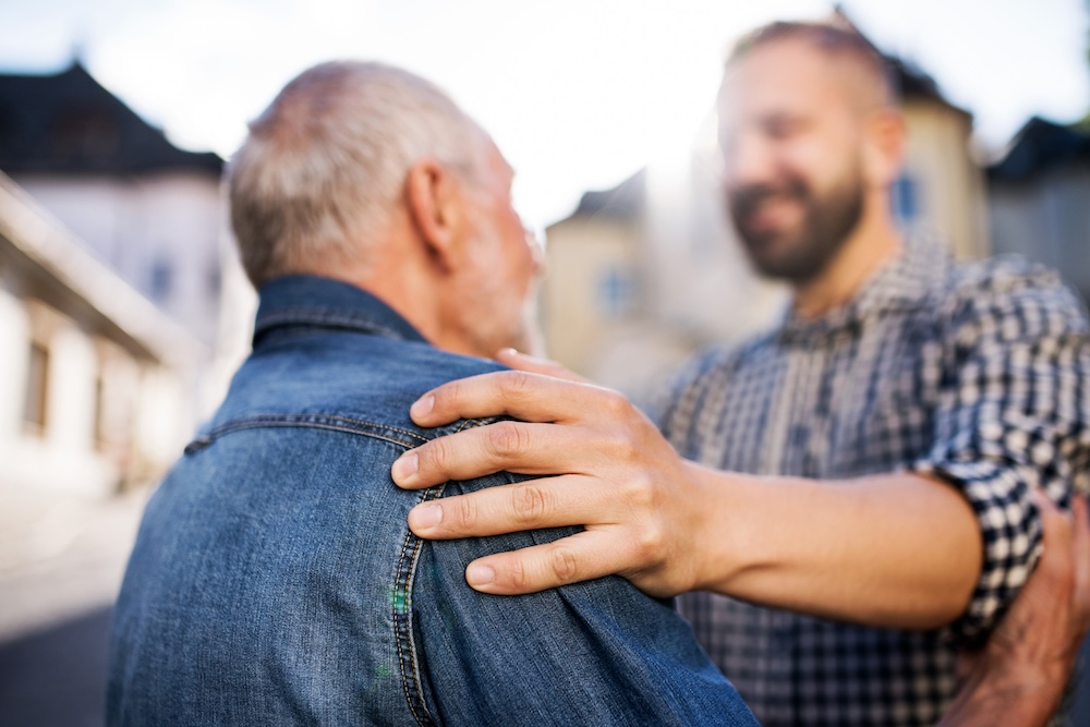 Father and son joyfully reuniting.